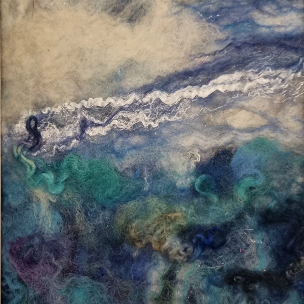 Textured artwork with blue, green, and purple tones